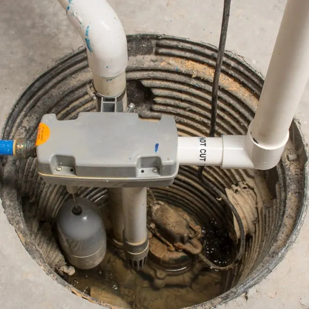 New sump pump and backup float installed in a Richmond Hill basement.